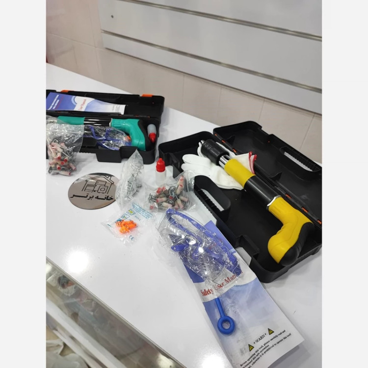 تفنگ میخکوب دستی چاشنی دار همراه با 20 عدد میخ